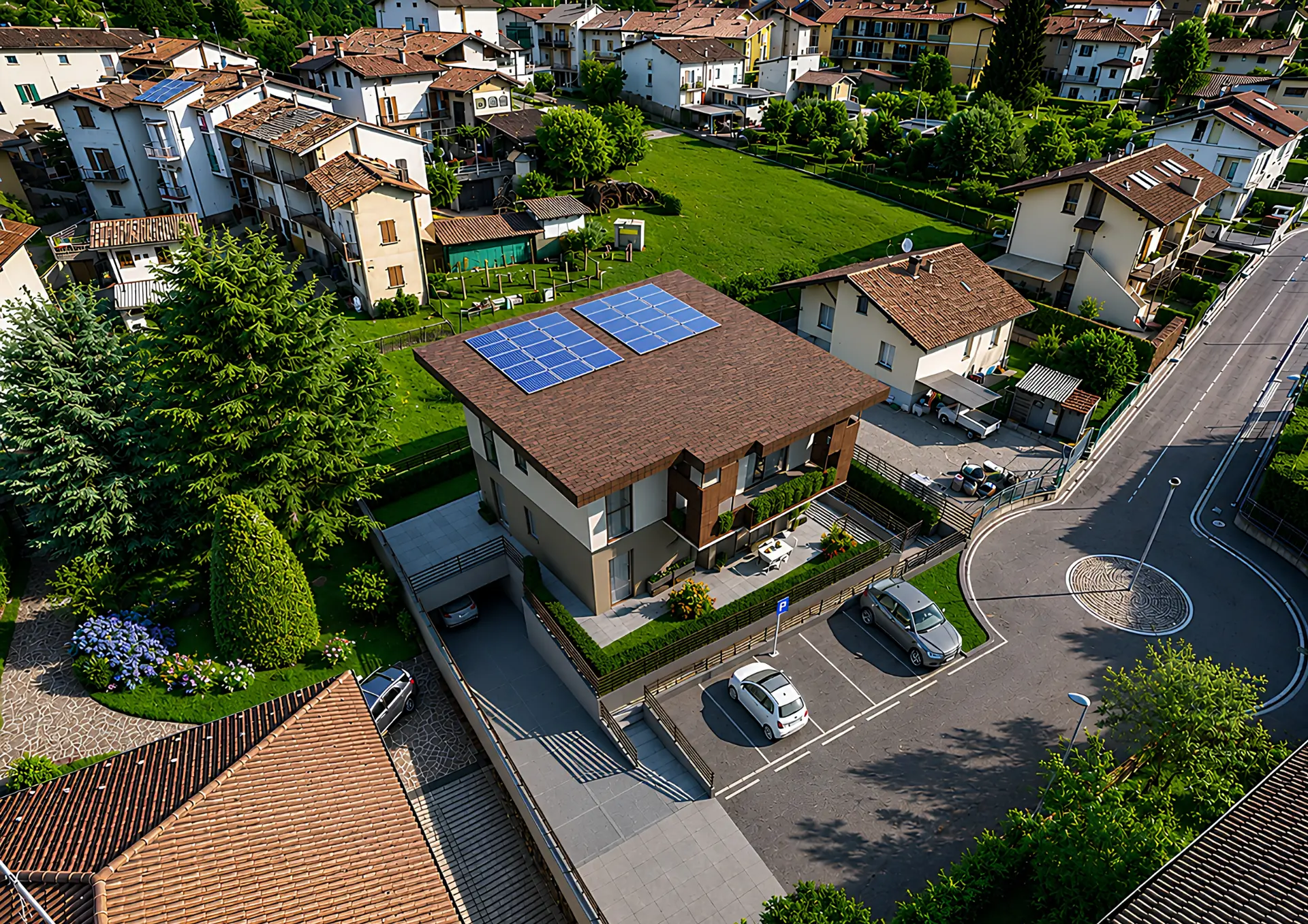Vista aerea di Residenza Emma: la bifamiliare nel suo contesto, la via residenziale che finisce in rotatoria e le villette circostanti.